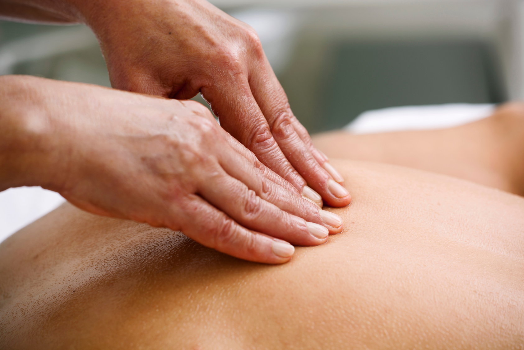 Client Getting a Deep Tissue Massage